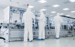 Workers Inspecting Manufacturing Of Semiconductors
